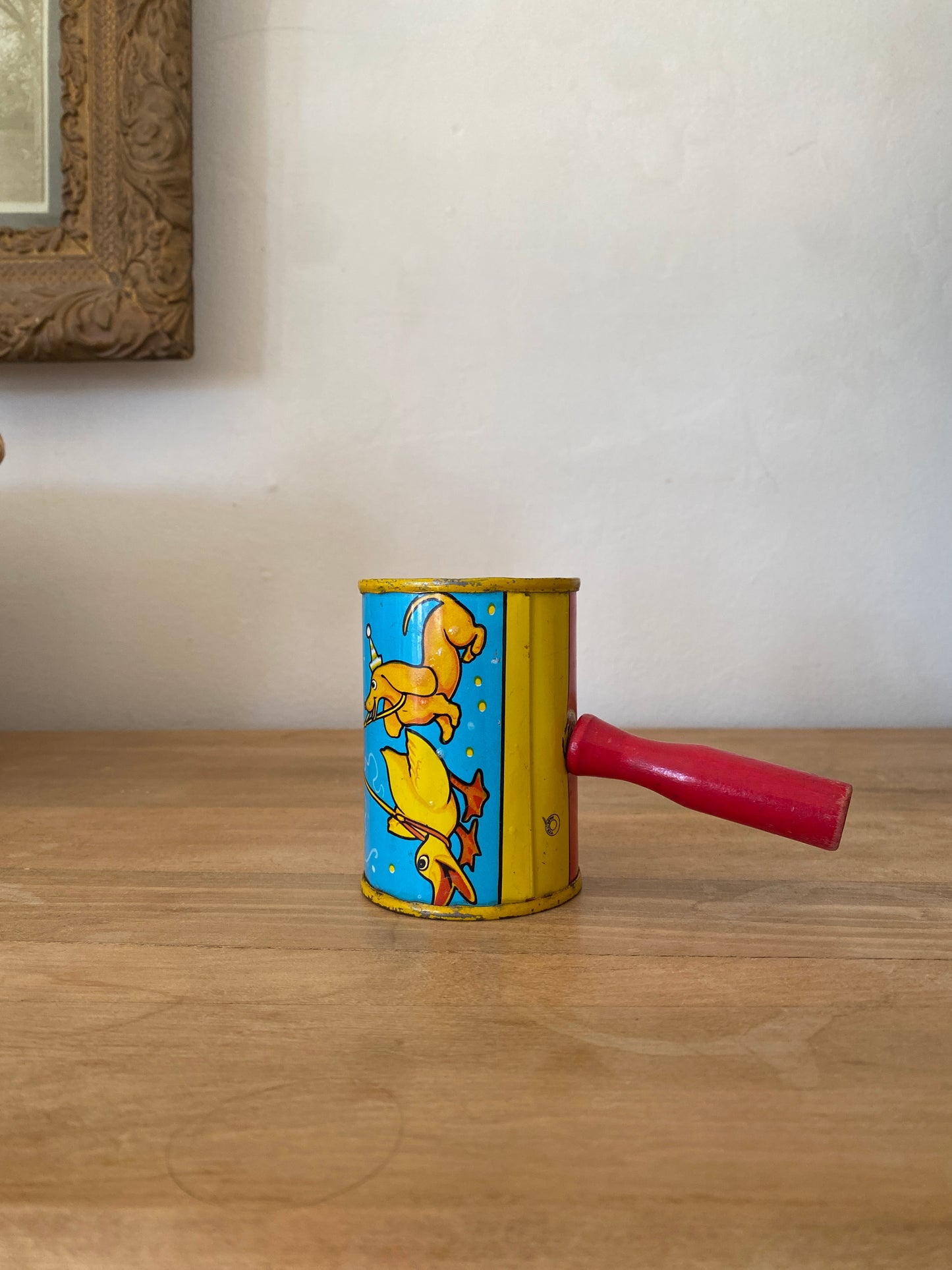 vintage tin rattle