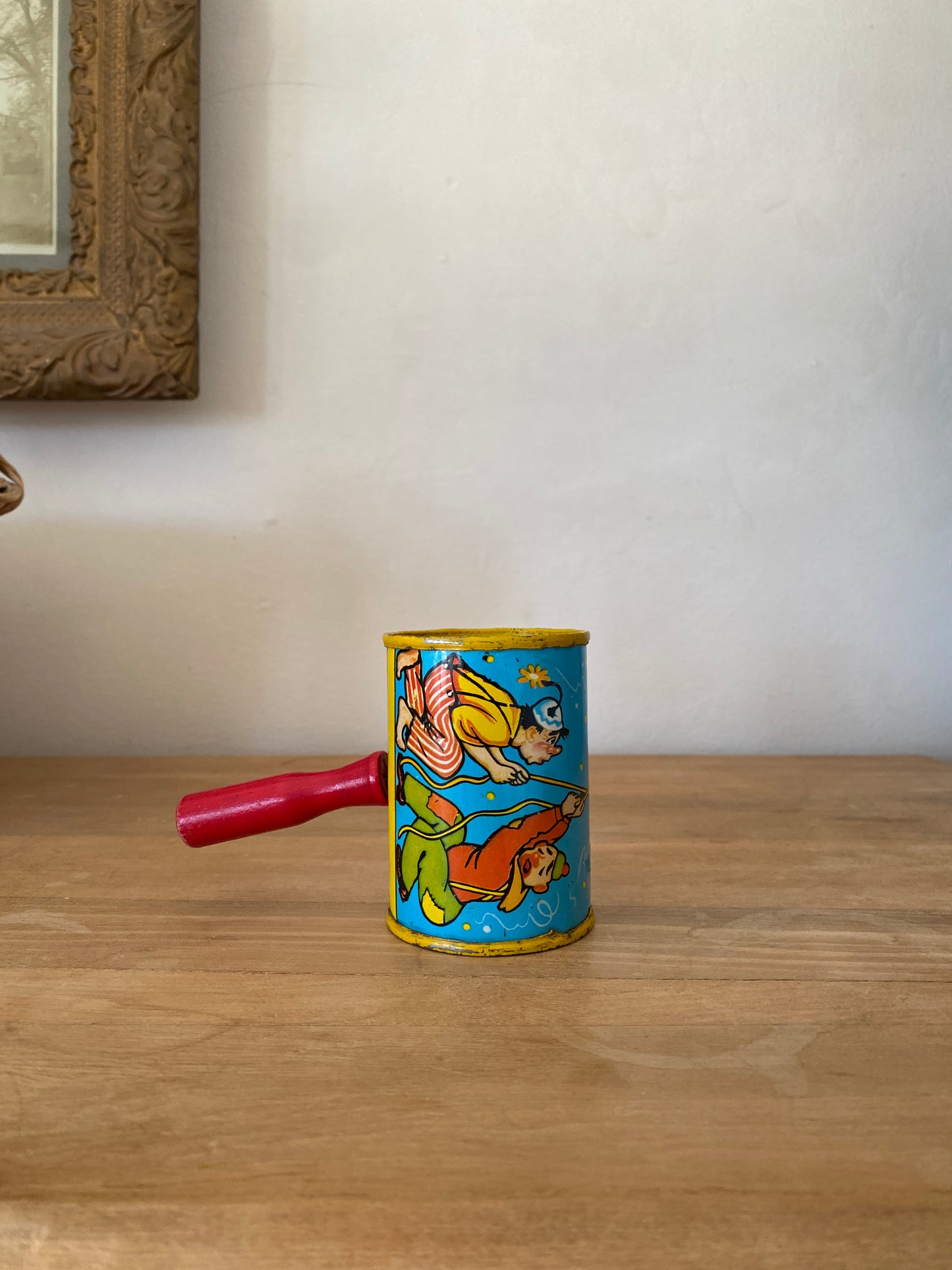 vintage tin rattle
